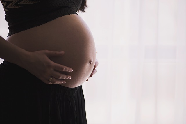 image of a pregnant person with sciatica